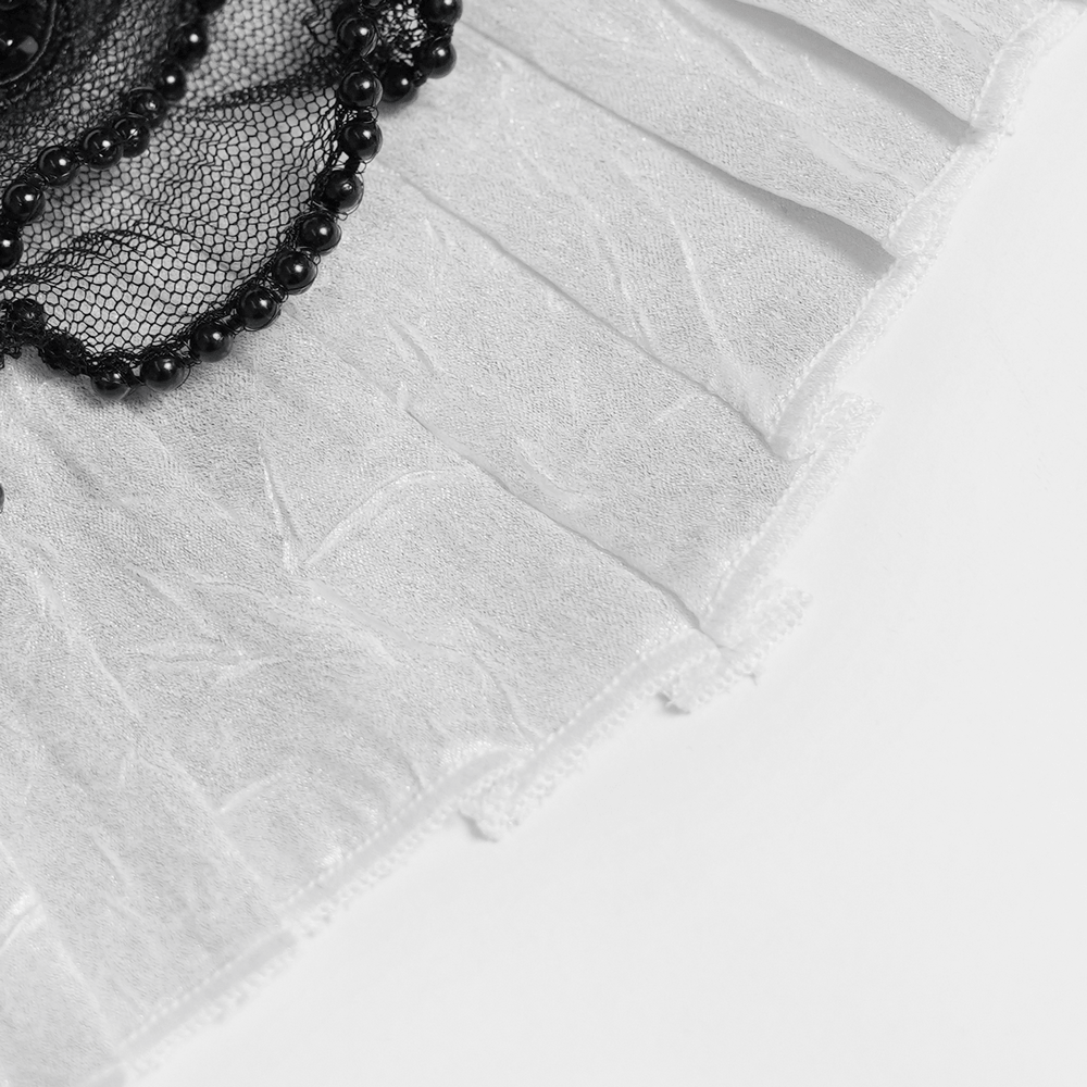 Close-up of White Victorian Gothic Shirt with Black Lace Jabot Trim featuring intricate lace and bead detailing.
