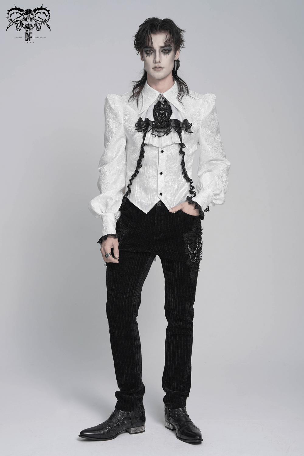 White Victorian Gothic Shirt with Black Lace Jabot Trim worn with elegant black pants and dramatic makeup.