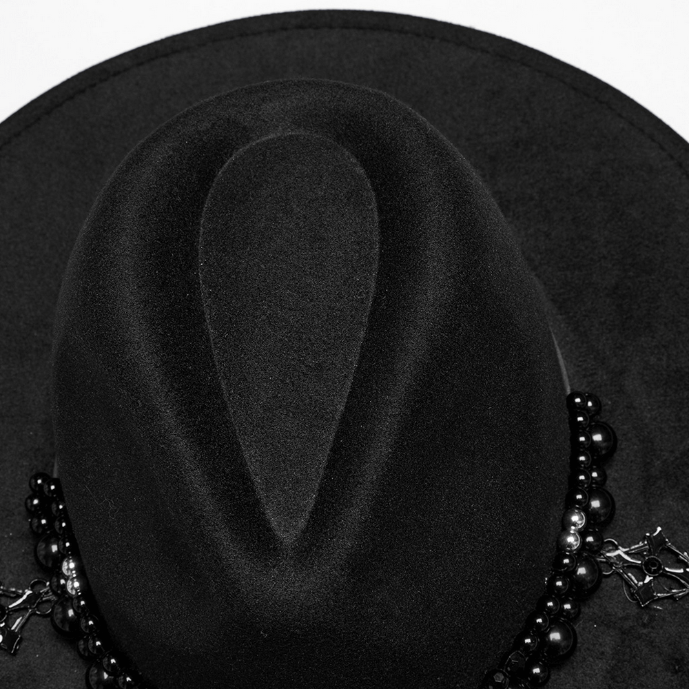 Elegant black suede gothic hat showcasing a wide brim and retro pearl bead details, perfect for a mysterious style.