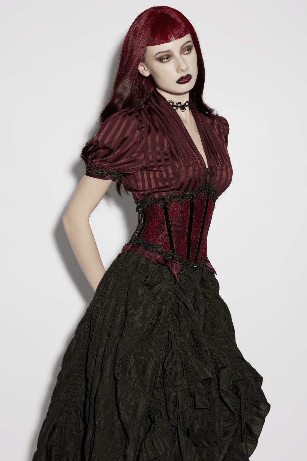 Alt Tag: Wine Red Black Lace Up Gothic Waist Cincher Corset on model with burgundy blouse and black skirt, dramatic gothic outfit