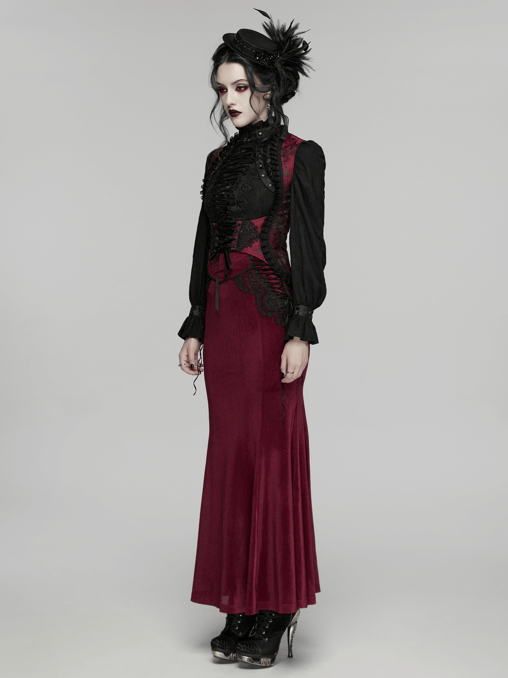Alt Tag: Wine Red Gothic Lace Trim Corset Vest with Drawstrings on model, black puff sleeves, lace-up details, elegant gothic look