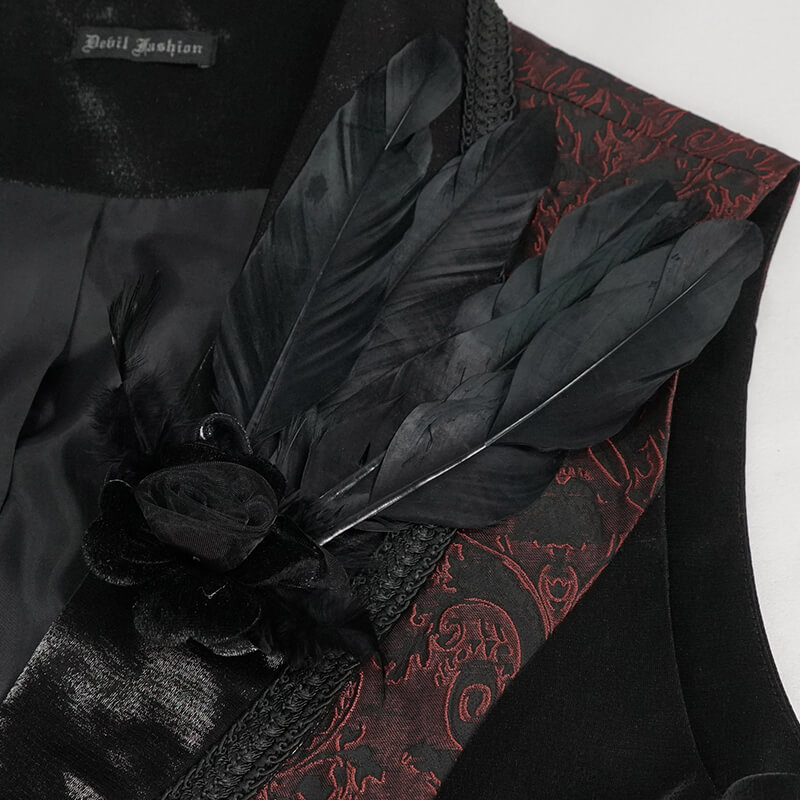 Black feathers and floral detail on a gothic retro waistcoat, perfect for alternative fashion lovers.