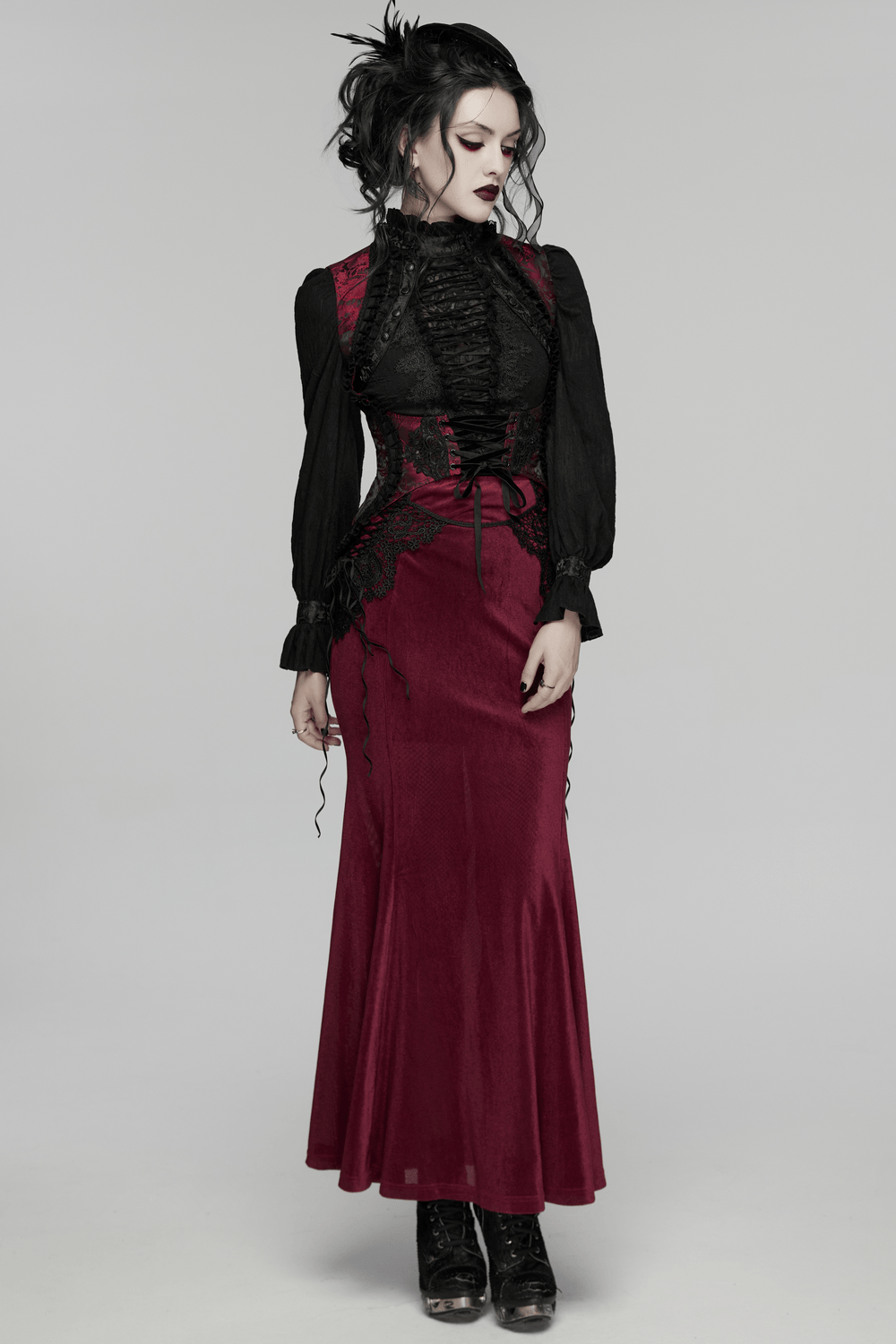 Wine Red Gothic Velvet Fishtail Skirt with Lace Details worn by a model showcasing its elegant silhouette.