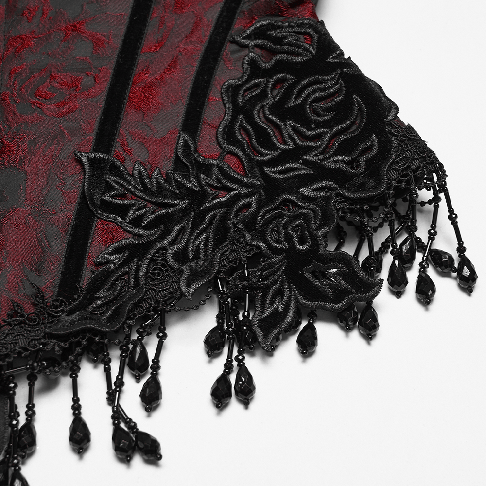 Alt Tag: Wine Red Jacquard Gothic Underbust Corset with Fringe close-up of black rose applique and beaded tassel fringe on red jacquard