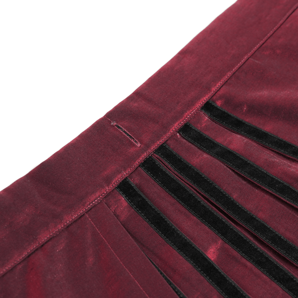 Close-up of wine red maxi skirt showing black lace hem and velvet panels for a gothic, Victorian-inspired look.