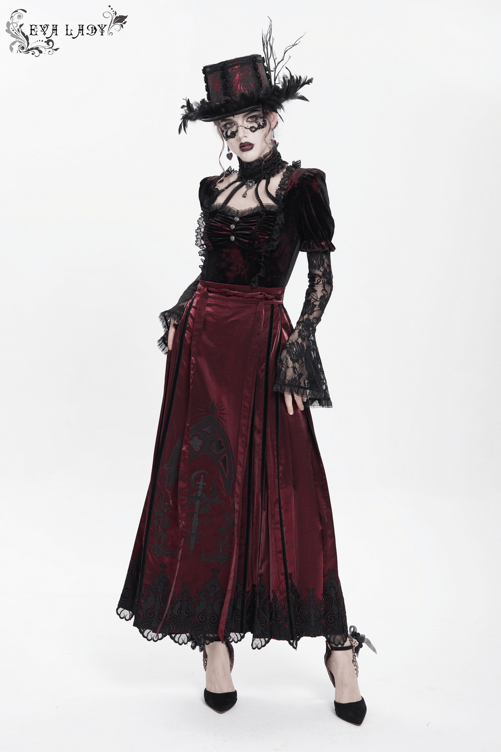 Gothic style model in a wine red maxi skirt with black lace hem and Victorian-inspired details, showcasing elegance.