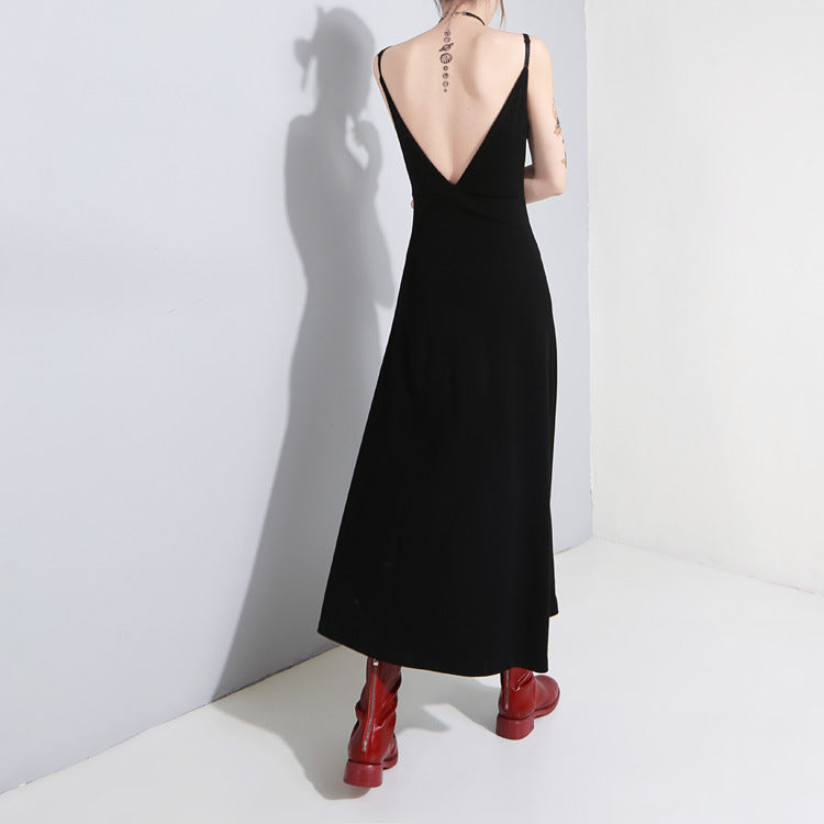 Women black asymmetrical spaghetti strap dress with a back v-neck, perfect for gothic fashion and summer events.