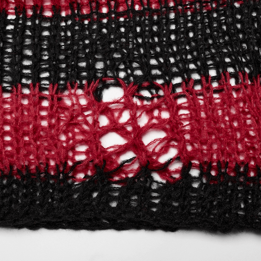 Close-up of the edgy gothic-striped mohair pullover sweater showing black and red color contrast with punk irregular holes.