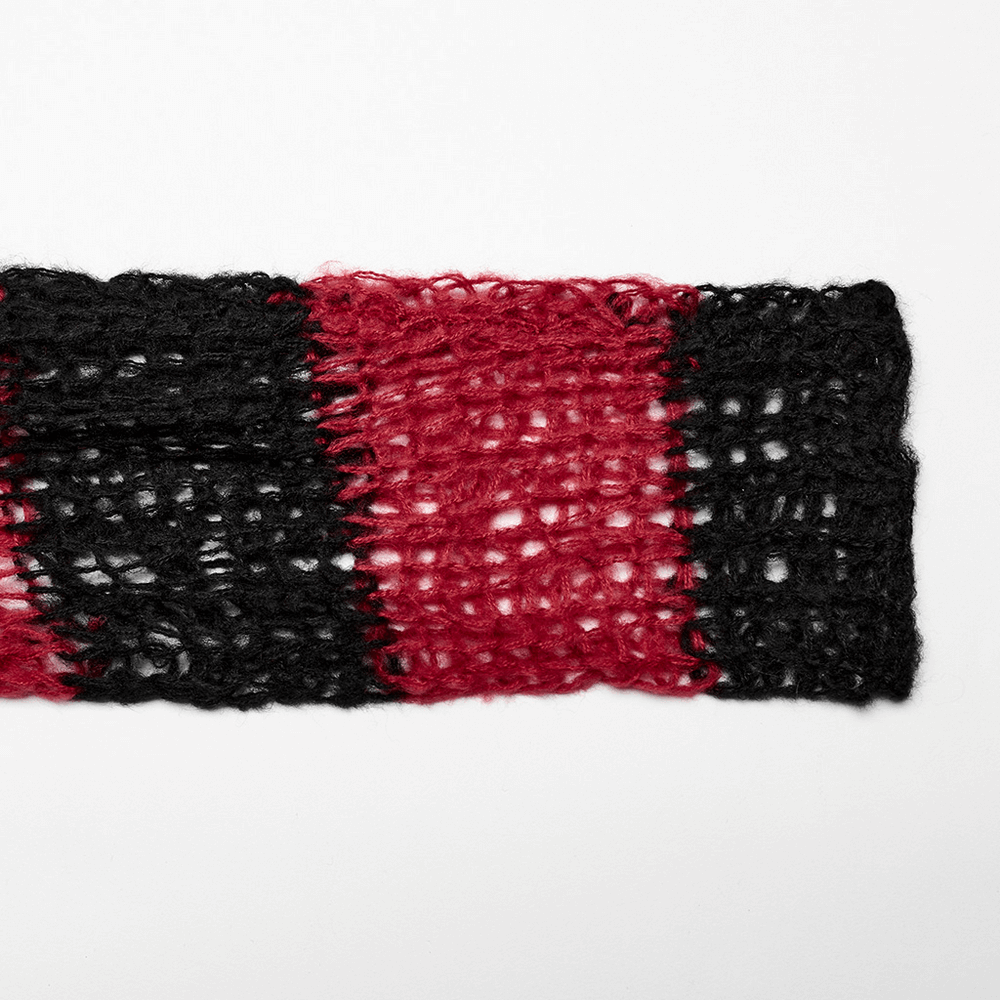 Close-up of a Gothic striped mohair texture featuring bold black and red colors, showcasing edgy design elements.