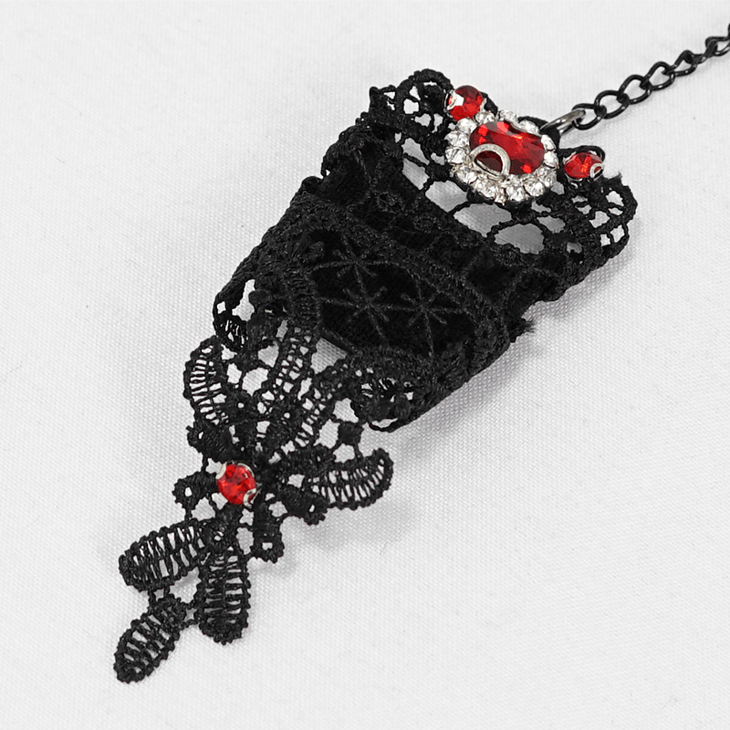 Elegant black lace glove adorned with red gems, perfect for gothic and Victorian-style fashion accessories.