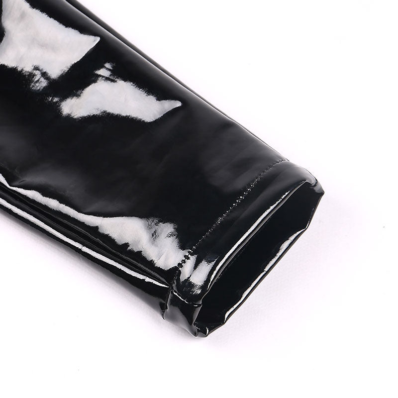 Close-up of shiny black PU leather leggings showcasing the sleek finish and back zipper detail.