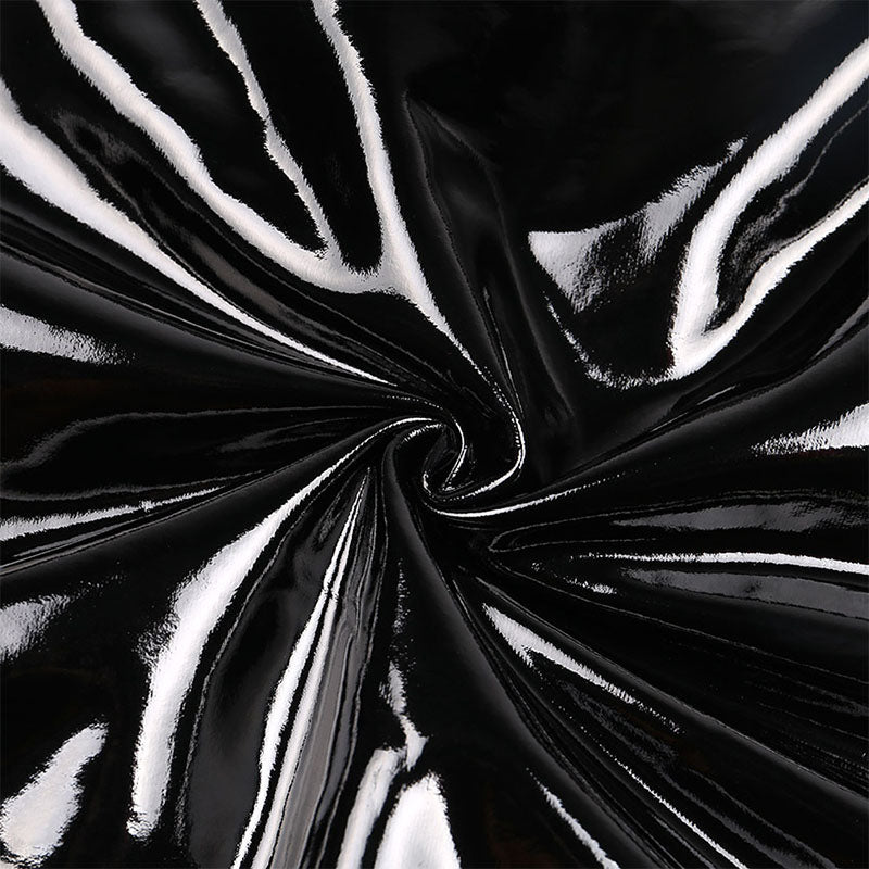 Close-up of shiny black PU leather fabric, perfect for women's sexy leggings with zippers.