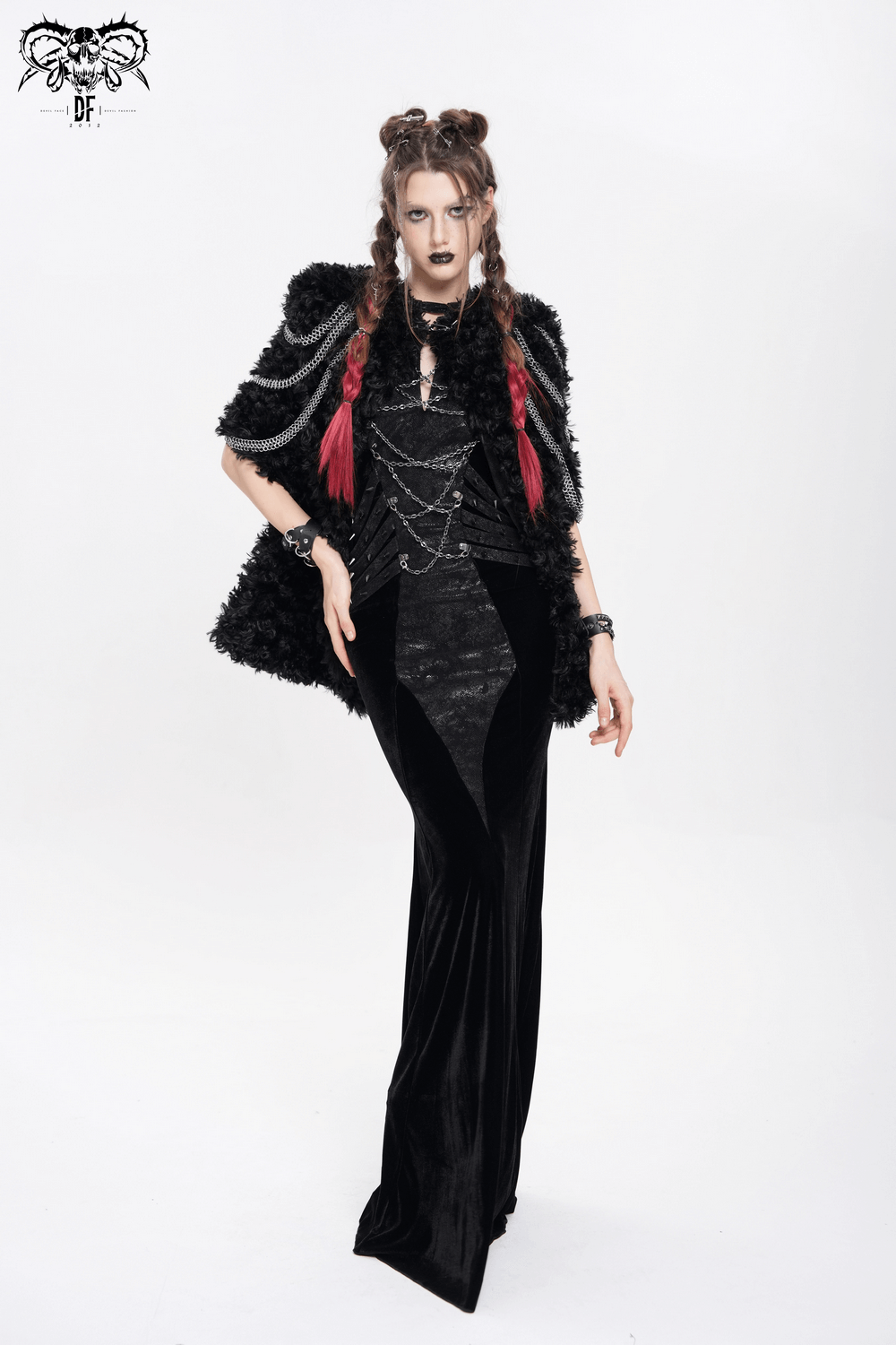 A model wearing a gothic faux fur hooded cape with chains, showcasing dark elegance and alternative fashion.