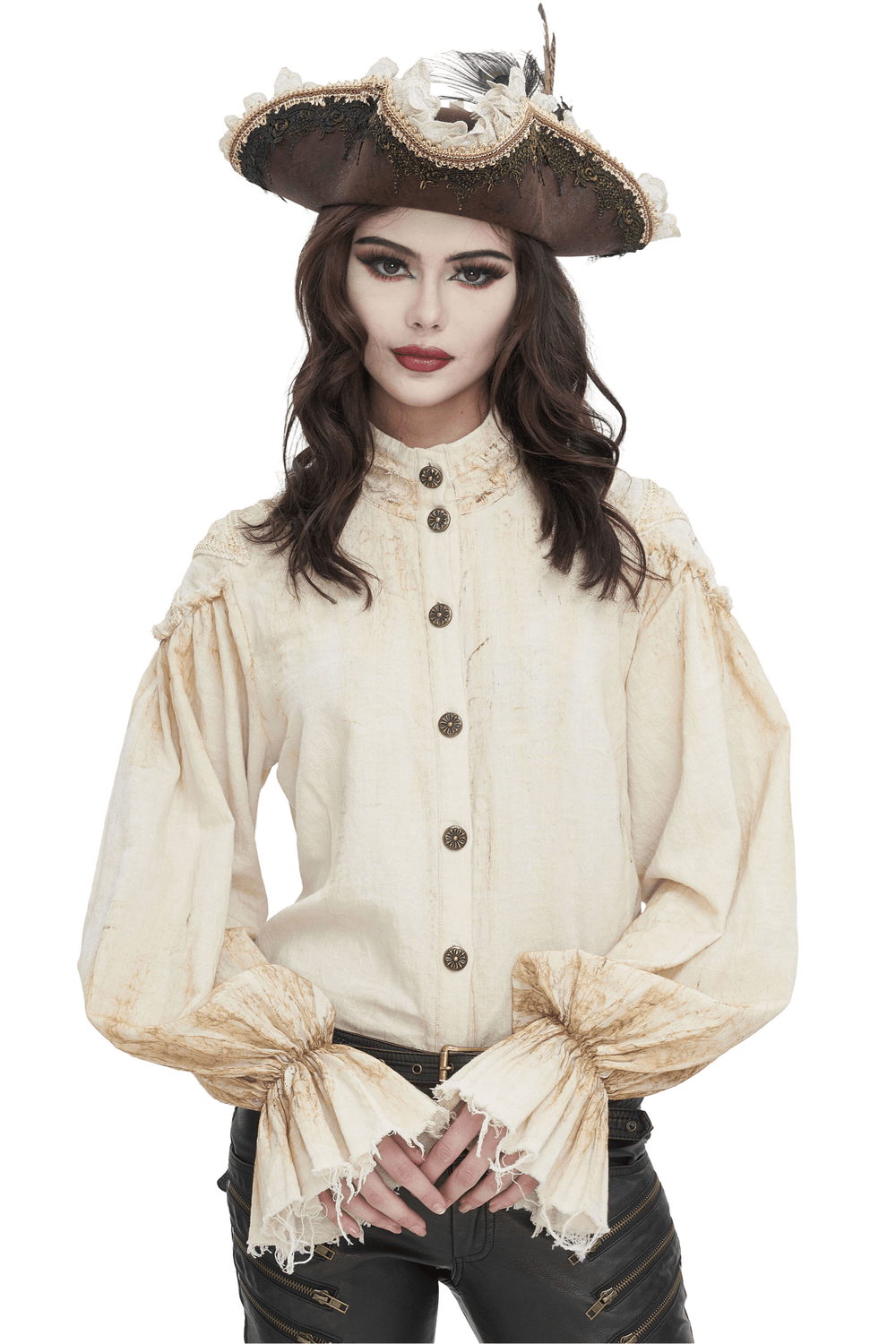 Woman in an antique ruffle sleeves shirt with buttons, wearing a stylish pirate hat for a vintage-inspired look.