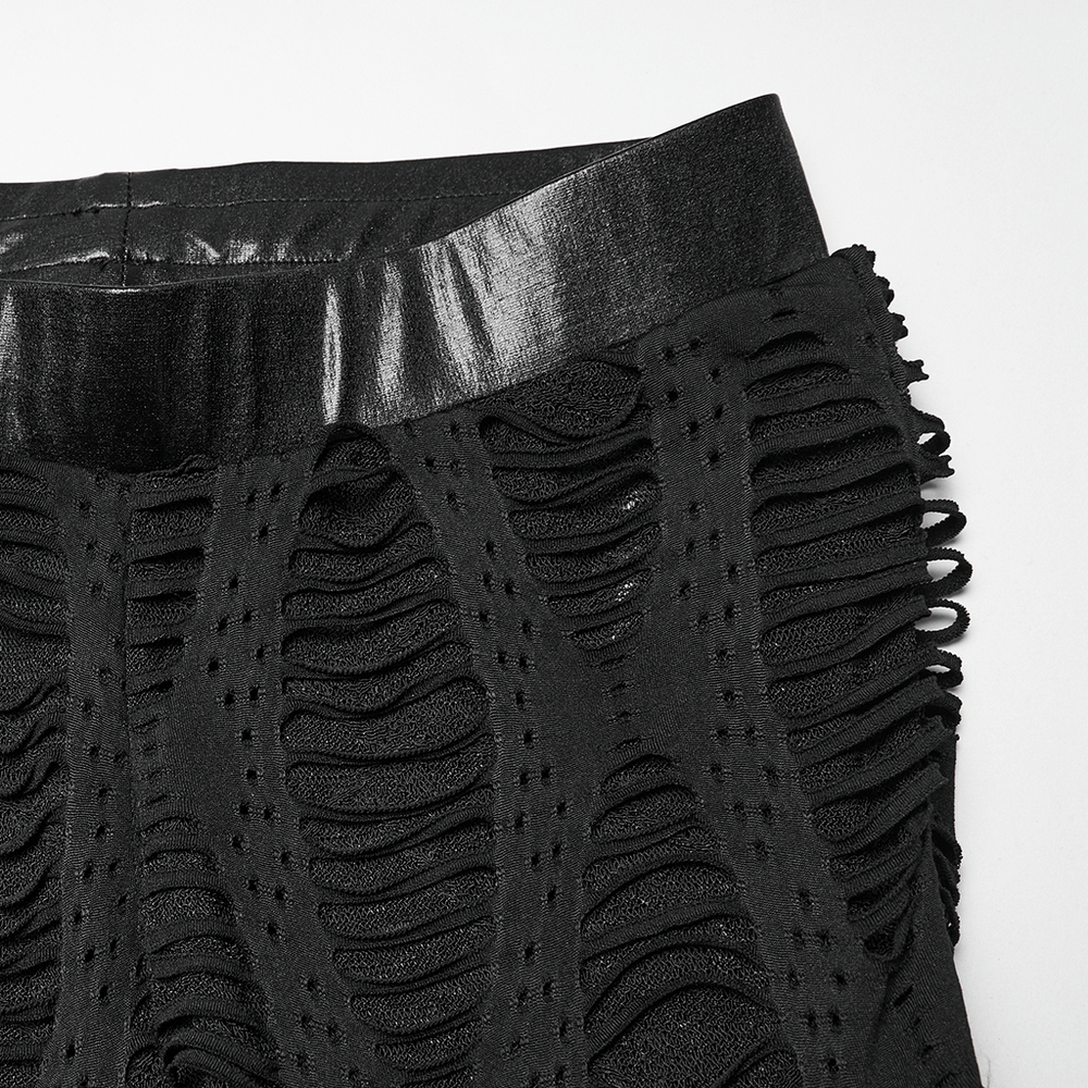 Close-up of Women's Black Buckled Leggings with Textured Design showcasing unique patterns and sleek waistband.