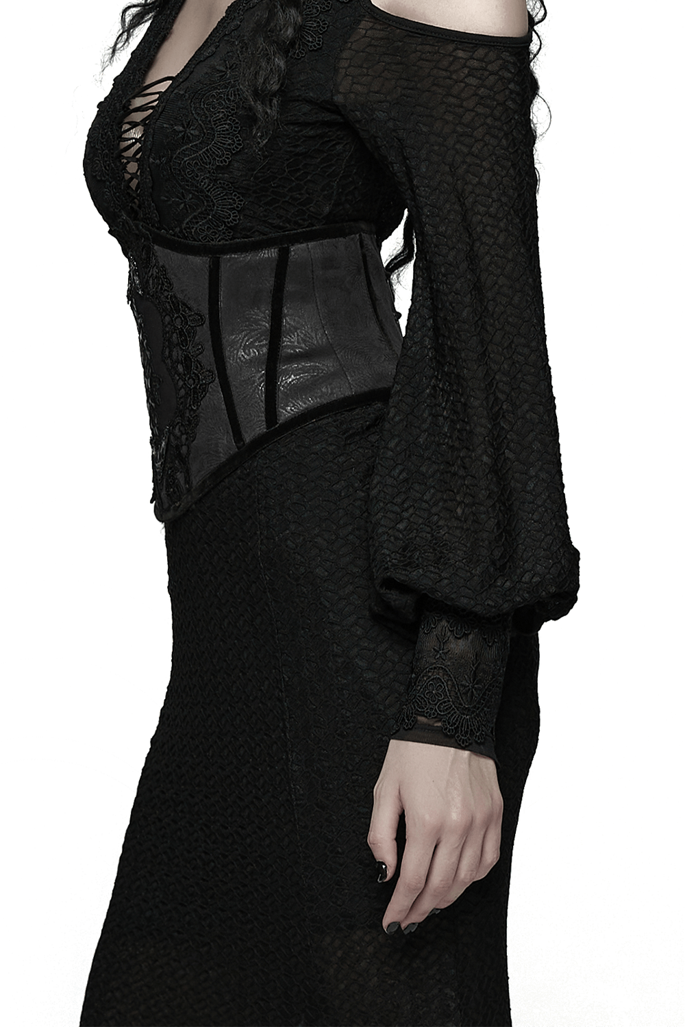 Women's Black Corset Belt with Embroidered Appliques worn over a black gothic dress, showcasing its embossed leather design.