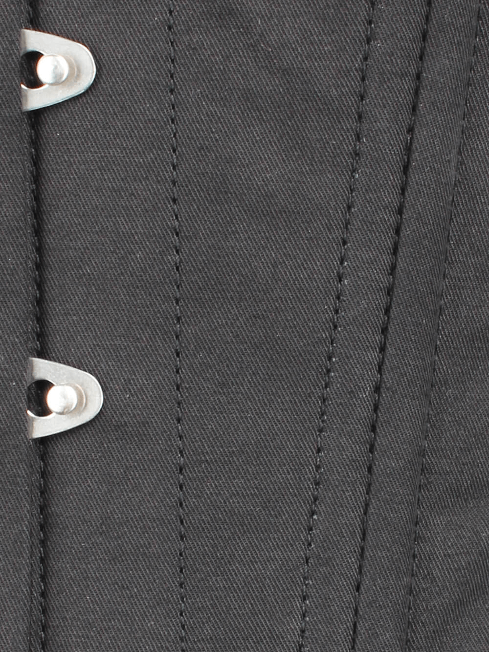 Close-up of a black cotton underbust corset showing metal busk and reinforced stitching for waist training.