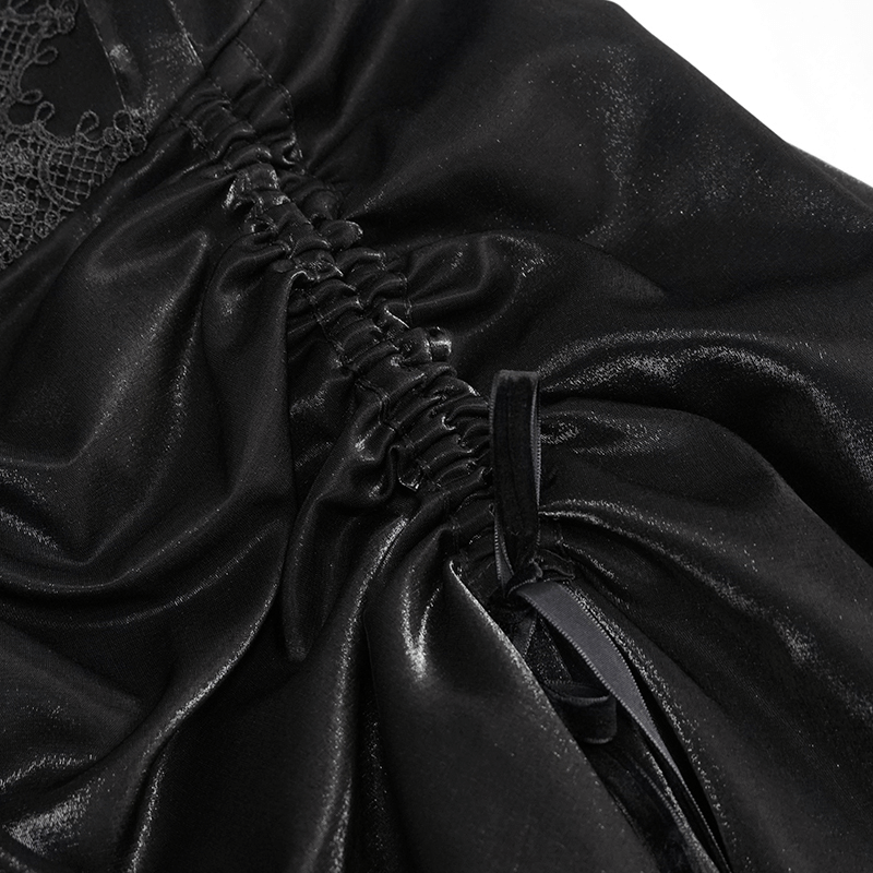 Close-up of black dress lace and drawstring detailing, showcasing gothic elegance and vintage charm.