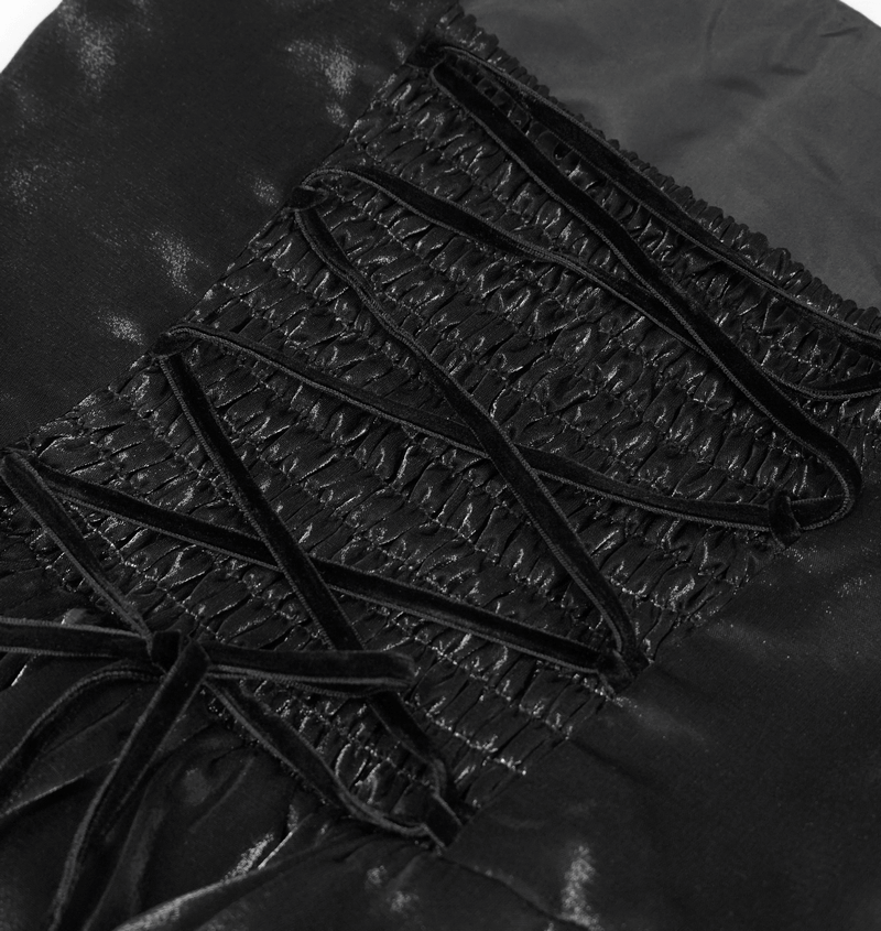 Close-up of black vintage dress showing lace splicing and drawstring detailing, perfect for gothic style outfits.