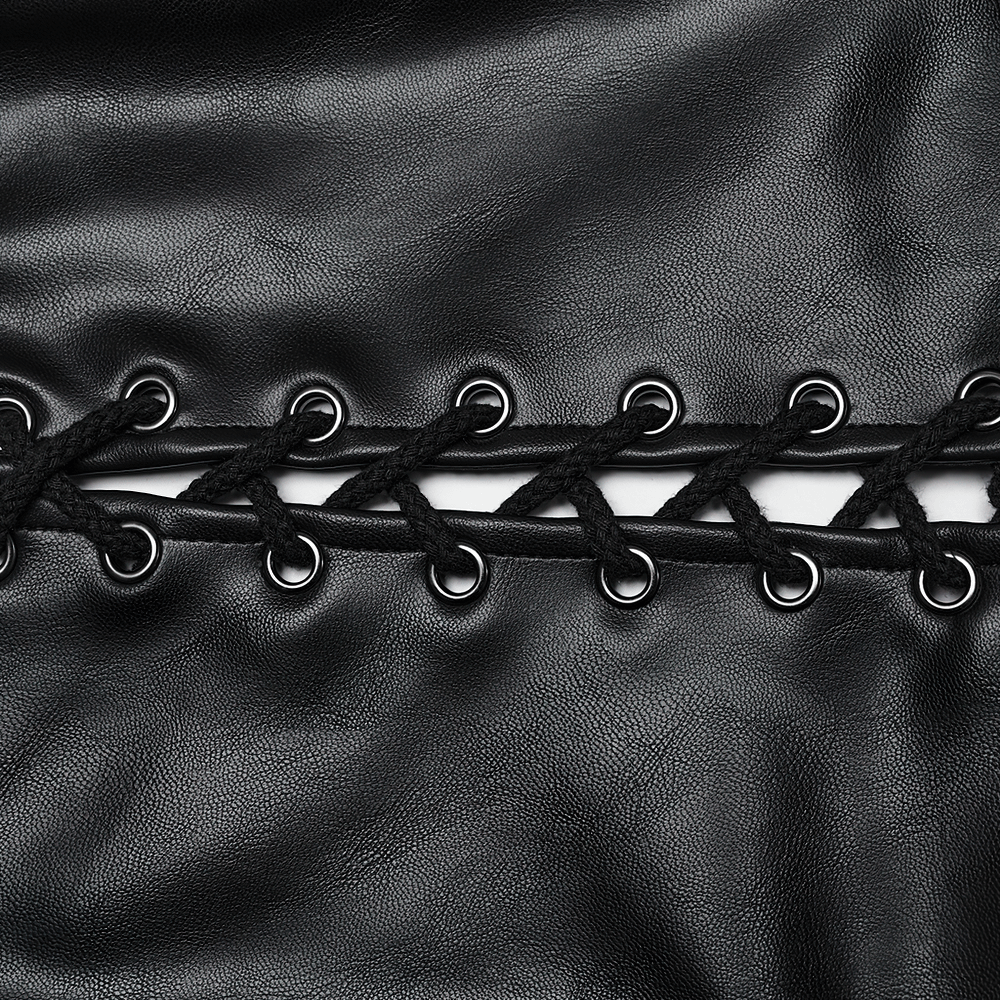 Close-up of black faux leather detail featuring lacing and metal eyelets, perfect for punk style fashion.