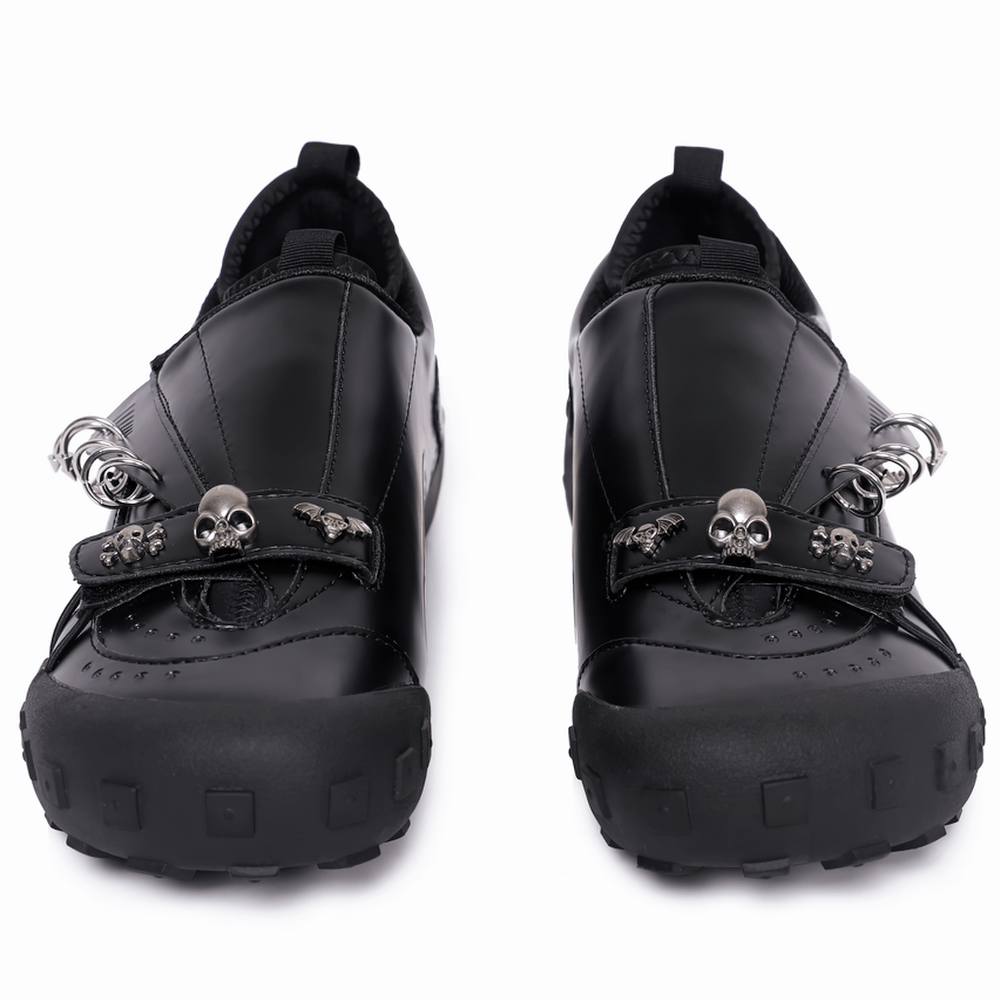 Women's Black Gothic Slip-On Shoes with Skull Accents black platform loafers with skull ornaments, metal rings, and lug soles