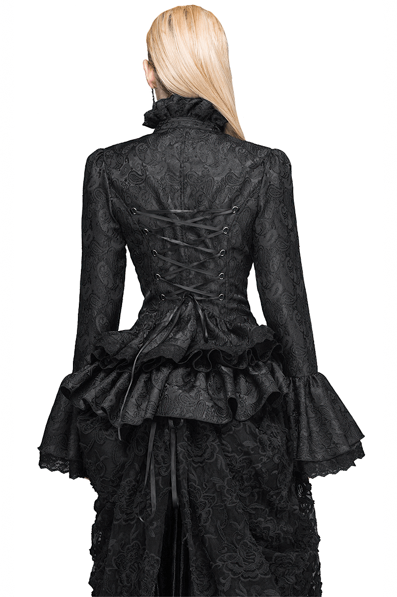 Elegant women's black gothic shirt with ruffles and flared sleeves, showcasing vintage style and intricate detailing.