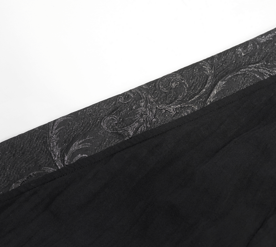Close-up of intricate black fabric featuring gothic floral details, perfect for a women's kimono dress.