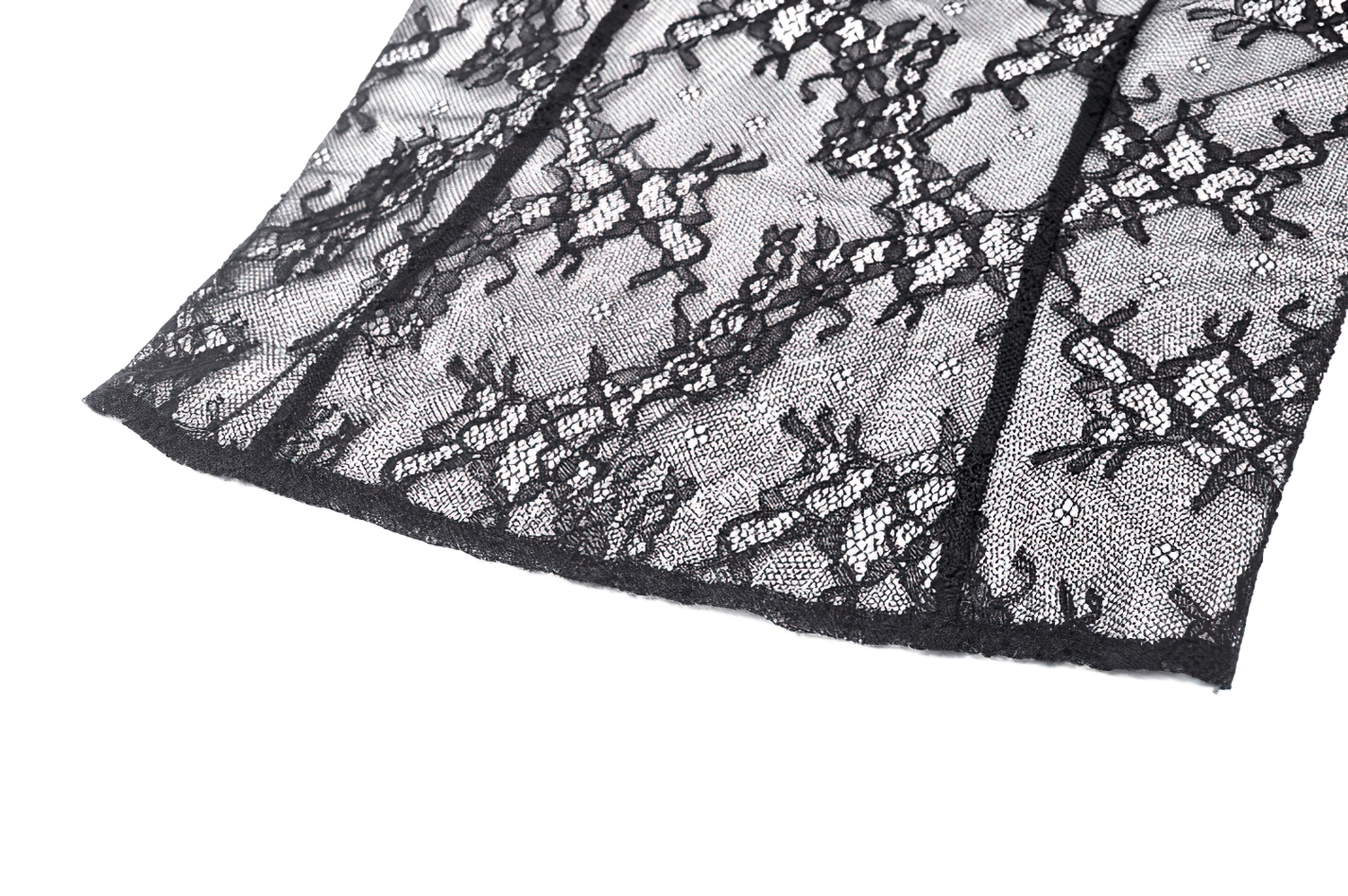 Close-up of intricate black lace fabric showcasing gothic detailing and sheer design.