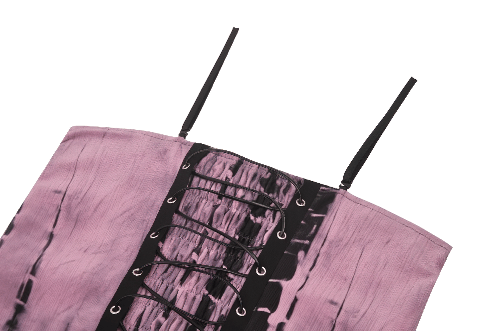 Close-up of women's pink tie-dye corset dress with black lace details and straps, showcasing edgy punk fashion.