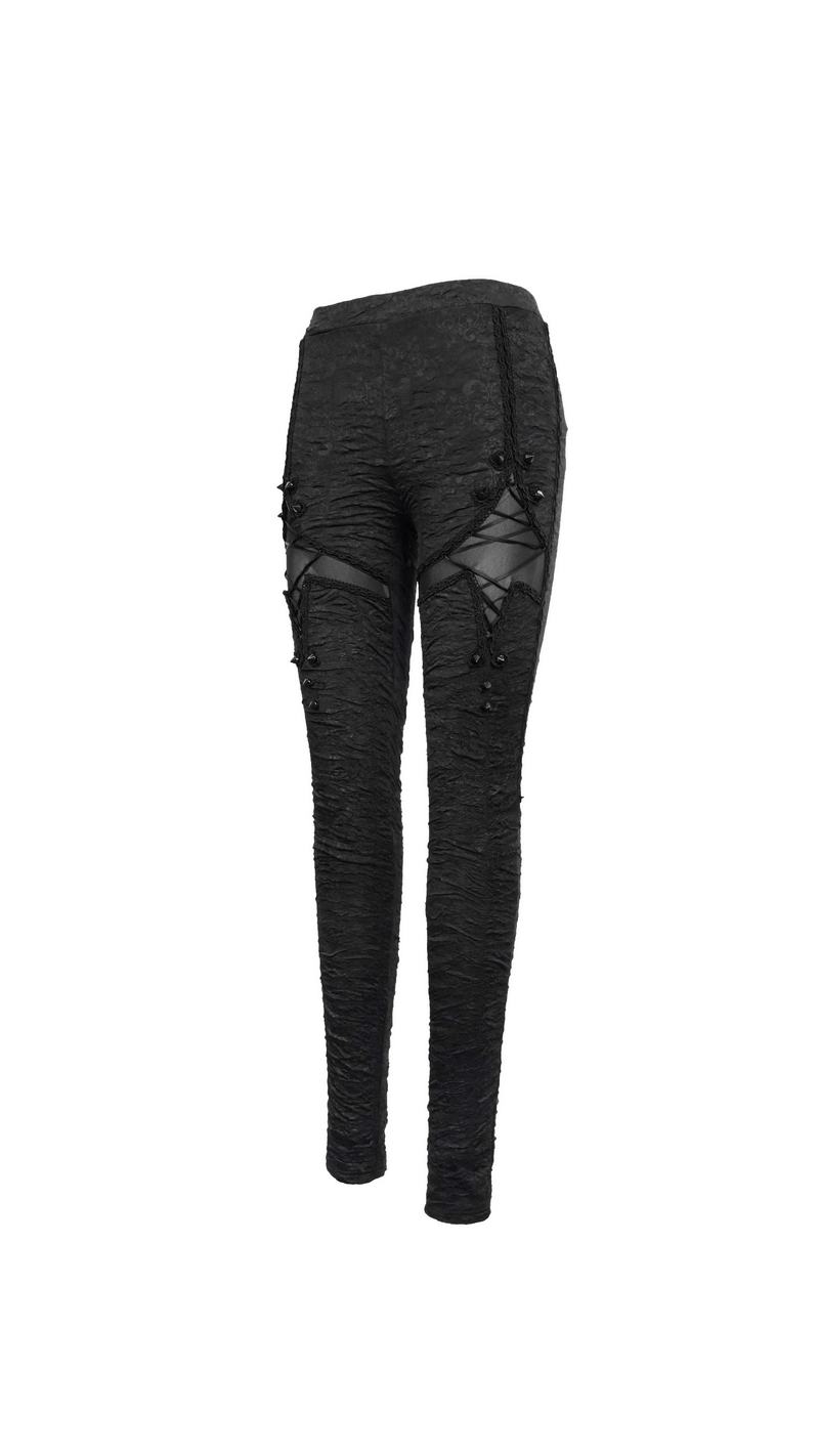 Women's black gothic leggings with red lacings and torn inserts for a trendy look, perfect for creating stylish outfits.