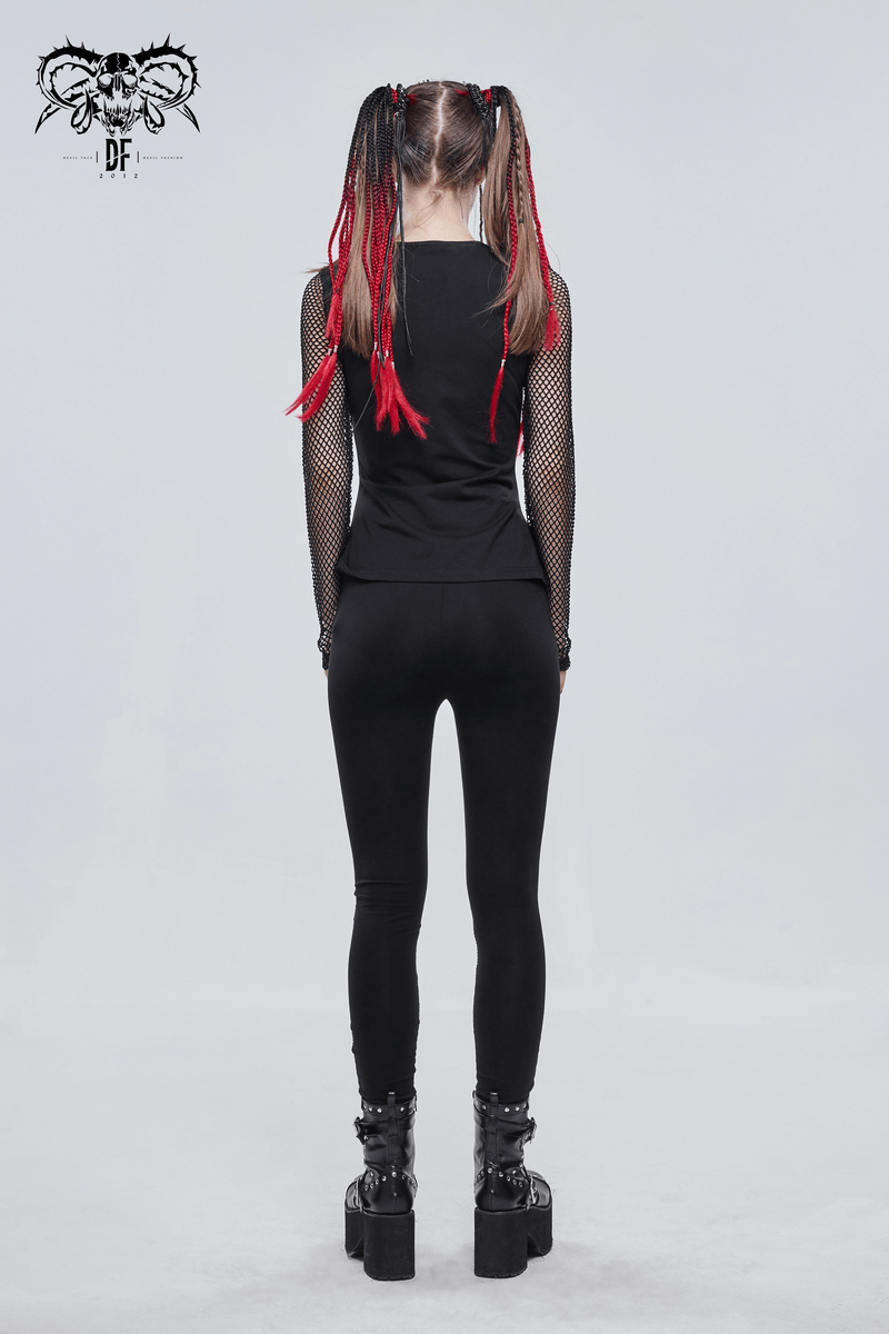 Back view of a woman in black leggings and mesh long sleeves, showcasing punk style and edgy fashion.