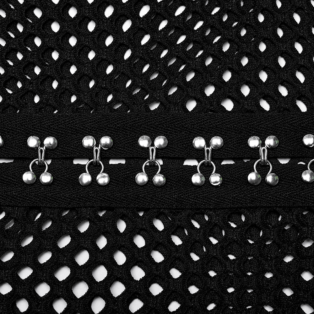 Close-up of black mesh fabric with silver webbing hooks, detail of edgy punk zip top.