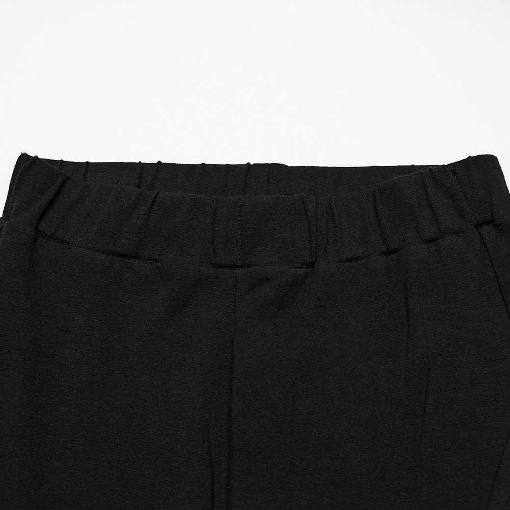 Close-up of women's black ruffle trim flare pants waistband, showcasing comfortable elastic fabric for a gothic style.