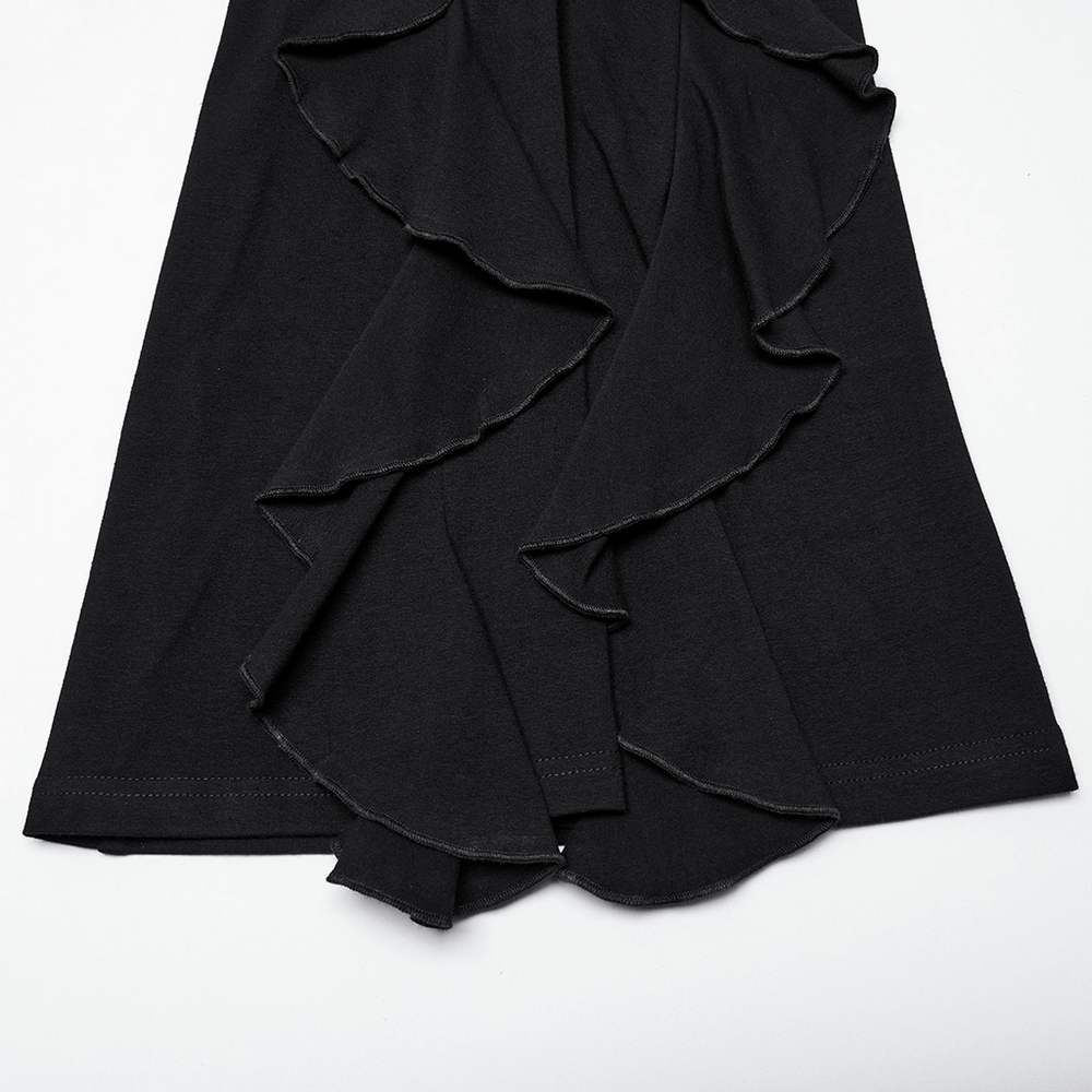 Close-up of women's black ruffle trim flare pants, showcasing dramatic ruffles for a gothic style.