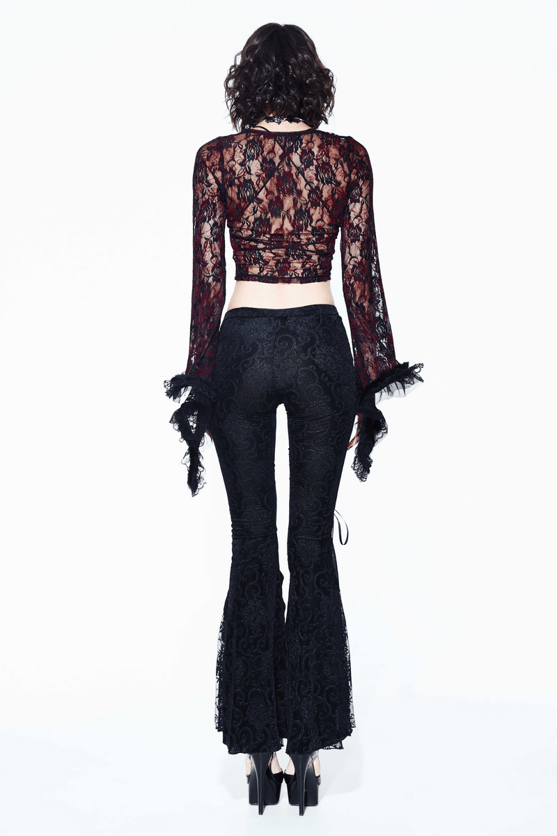 Back view of a model wearing sexy black lace flare pants and a lace top suitable for gothic style fashion.