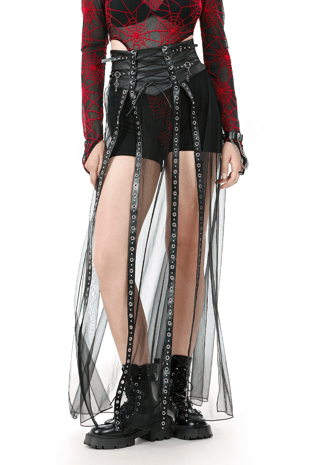 Gothic outfit featuring red spider-web mesh top, black mini skirt, and dramatic sheer panels, perfect for edgy fashion lovers.