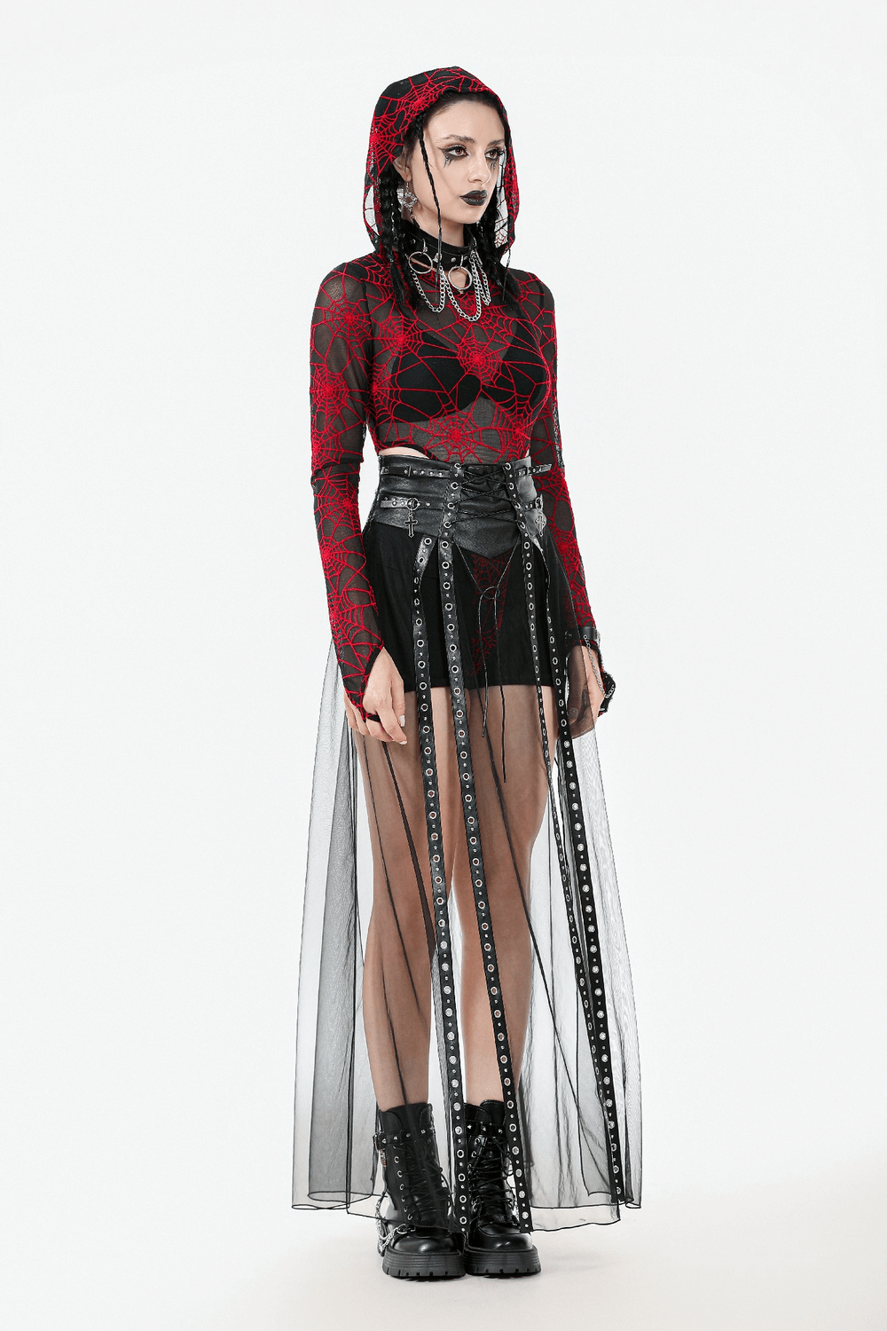 Gothic-inspired women's outfit featuring a red spiderweb hoodie, sheer maxi skirt, and edgy black boots.