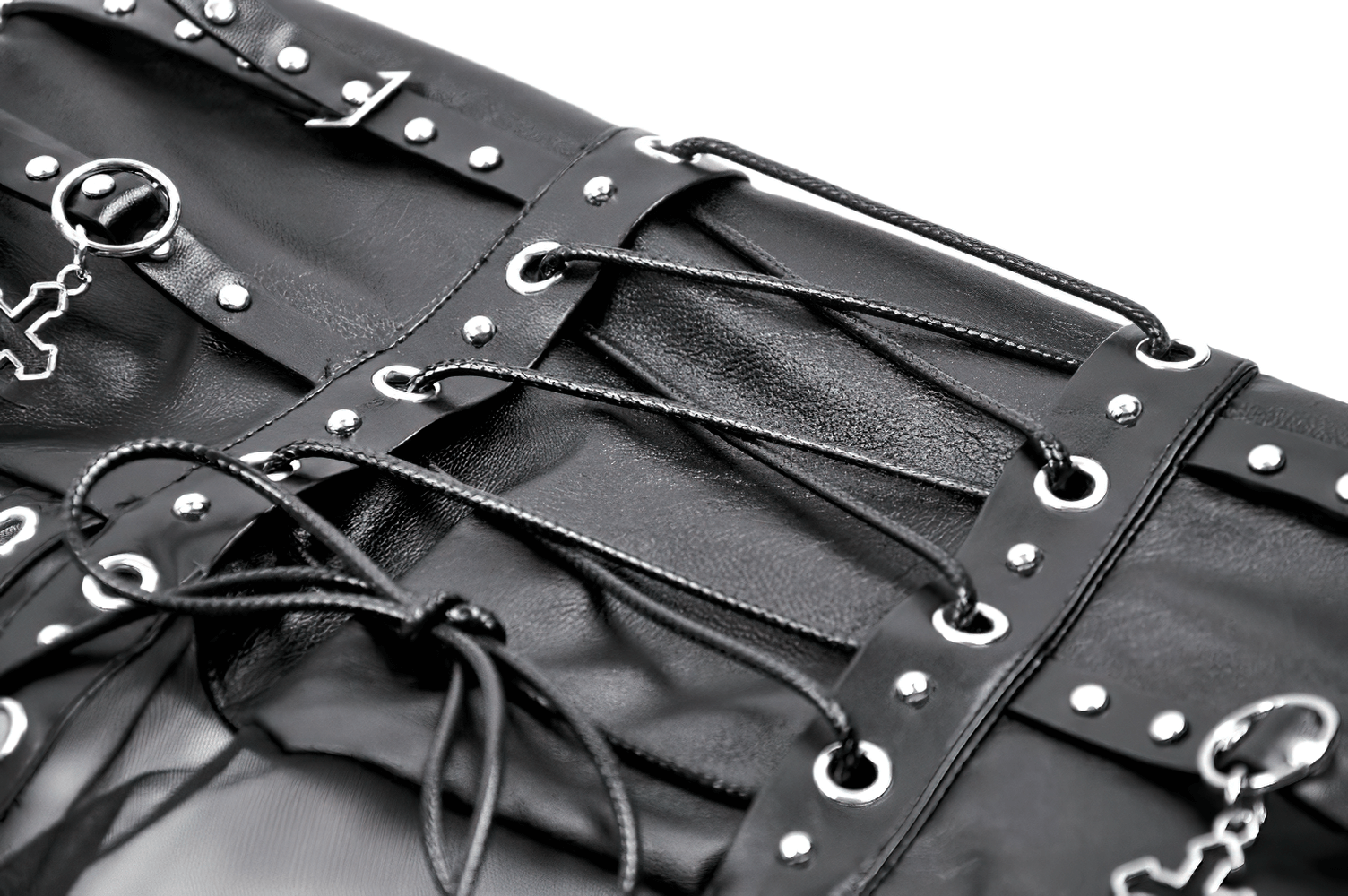 Close-up of black sheer maxi skirt's lace-up waist with stud detailing for gothic fashion lovers.