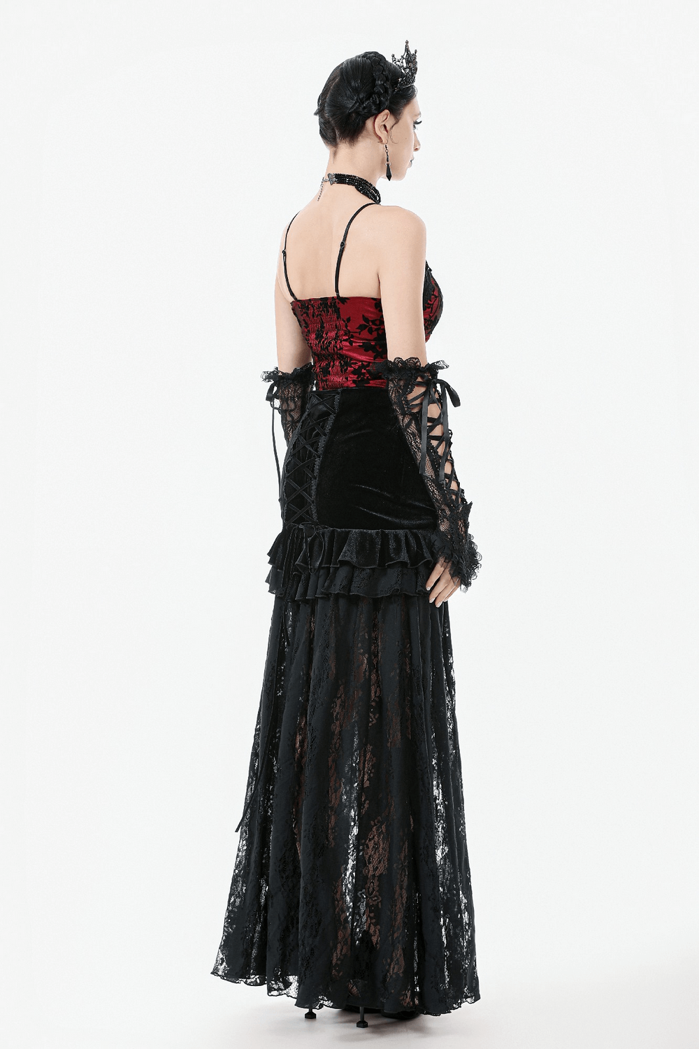 Back view of a Victorian-inspired black velvet and lace maxi skirt with corset detailing, perfect for gothic fashion.