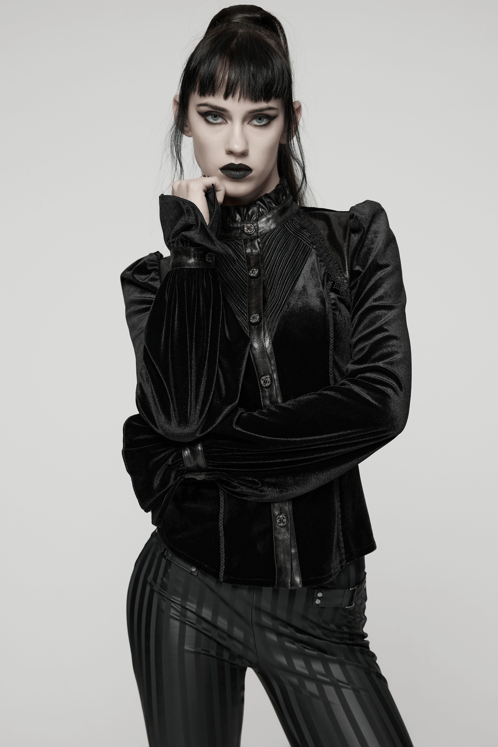 Women's Black Velvet Blouse with Lace Up Back Detail featuring dramatic puffed sleeves and vintage design.