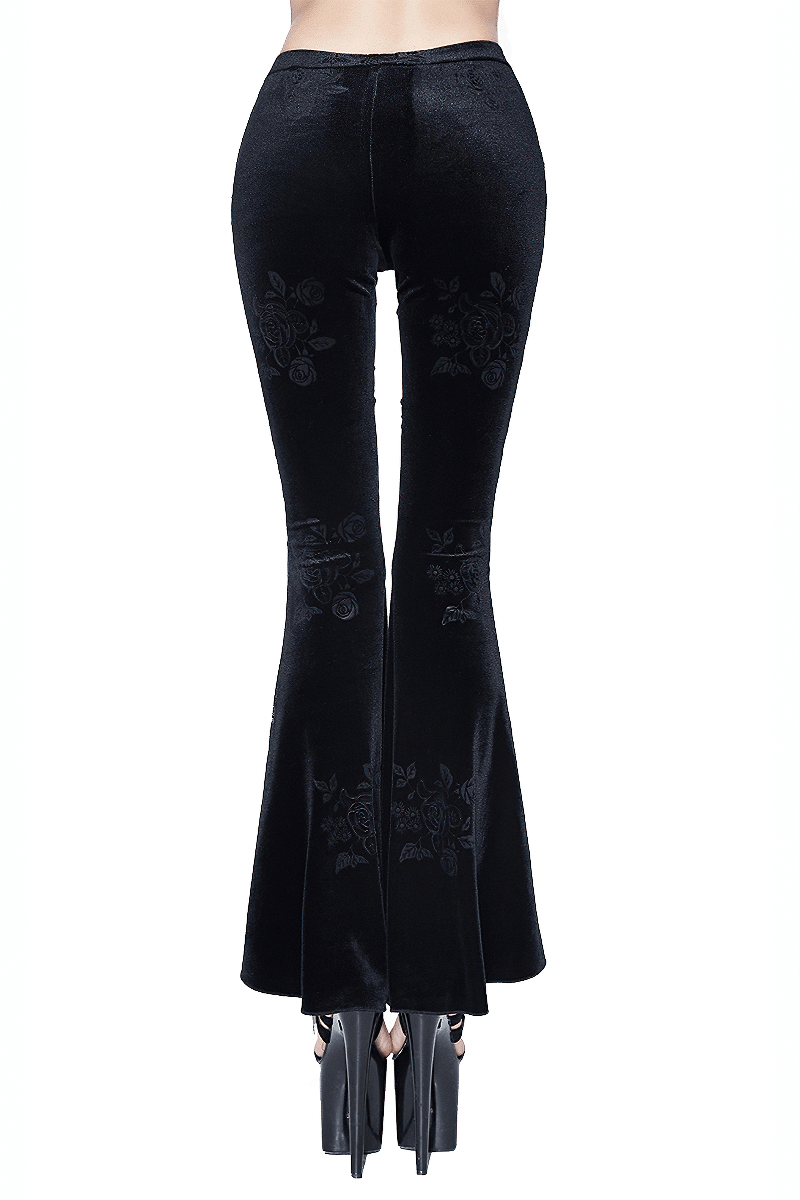 Elegant women's black velvet flared pants with lace and embroidery, perfect for a gothic wardrobe.