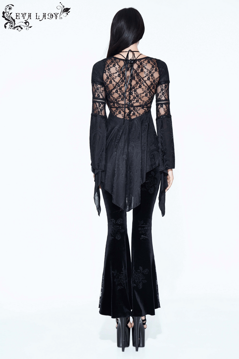 Elegant woman in black gothic outfit showcasing lace top and velvet flare pants from the back.