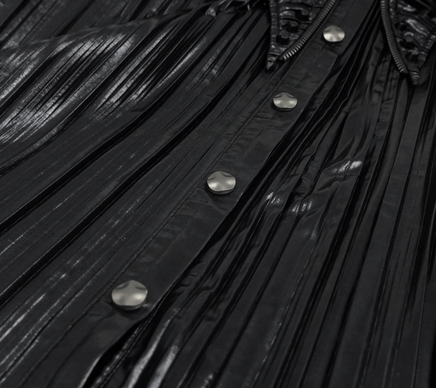 Close-up of a shiny black pleated blouse featuring metallic buttons and detailed collar, perfect for a cyberpunk style.