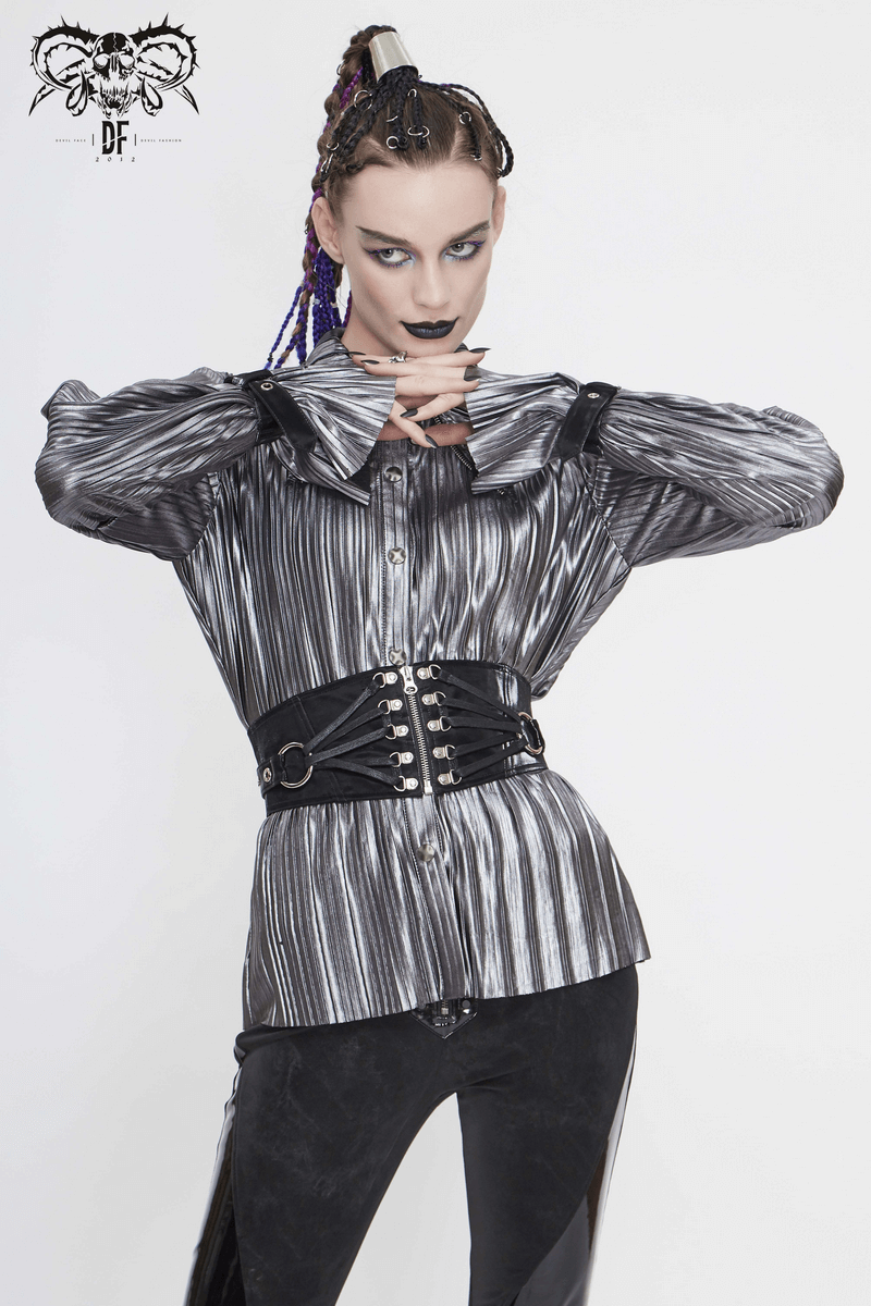 Fashionable model wearing a women's bright silver shimmer long ruffle sleeved blouse with a cyberpunk aesthetic.