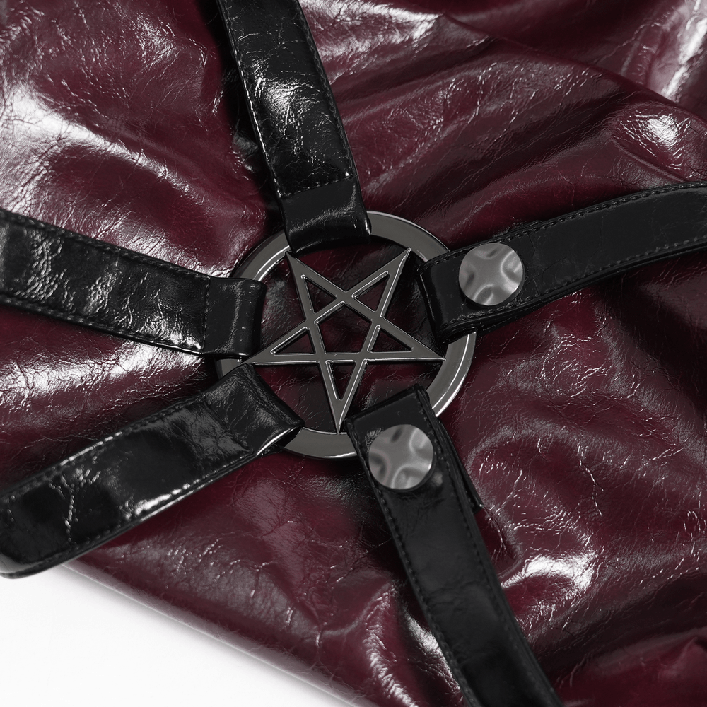 Close-up of the harness detail on Women's Burgundy Faux Leather Harness Long Coat featuring a pentagram design.