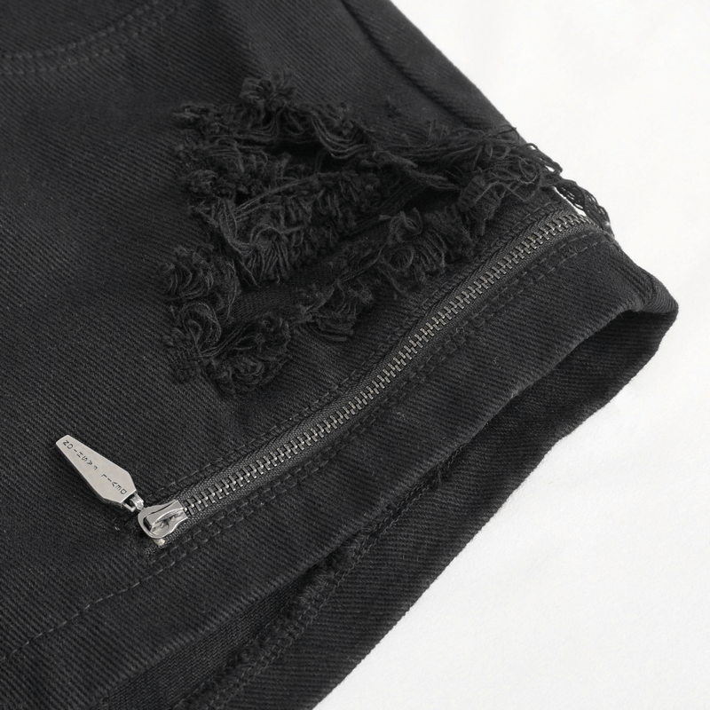 Close-up of women's punk shorts showing rips and front zipper detail, perfect for stylish rebellion.