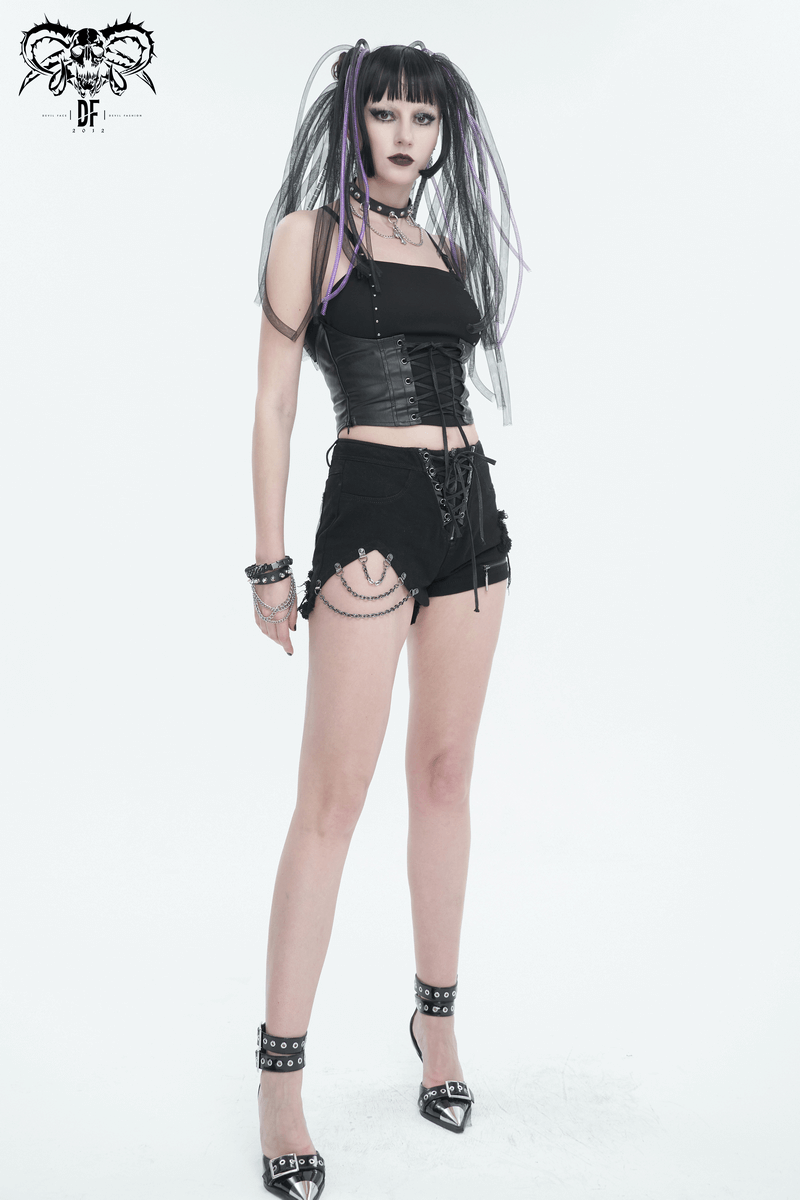 Stylish model showcasing women's chains ripped shorts with front zipper and lace-up pockets in punk style.