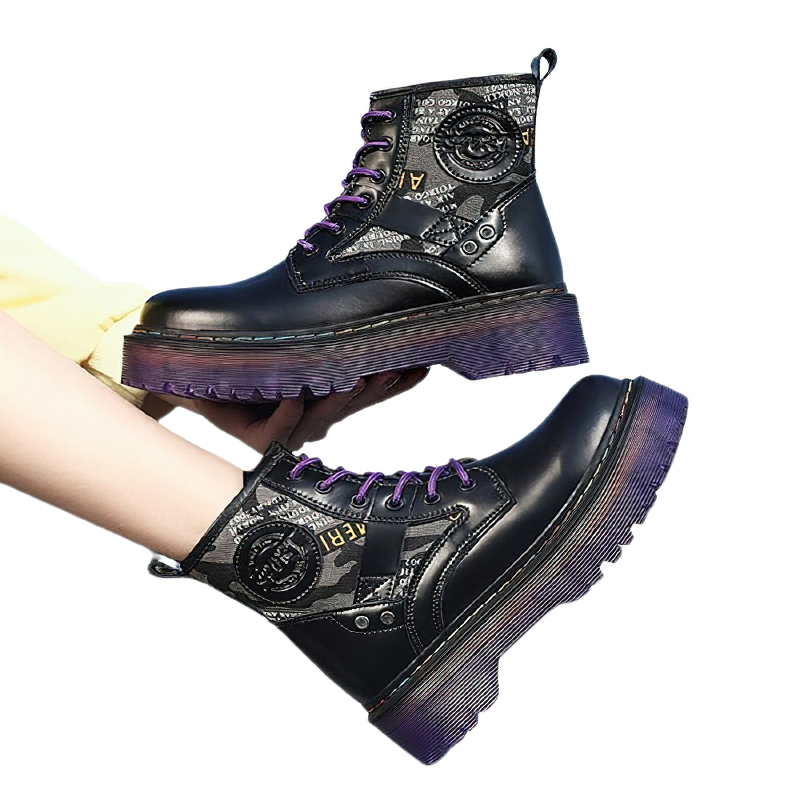 Women's chunky short ankle boots with lace-up closure, unique patches, and gradient sole, perfect for alternative fashion.