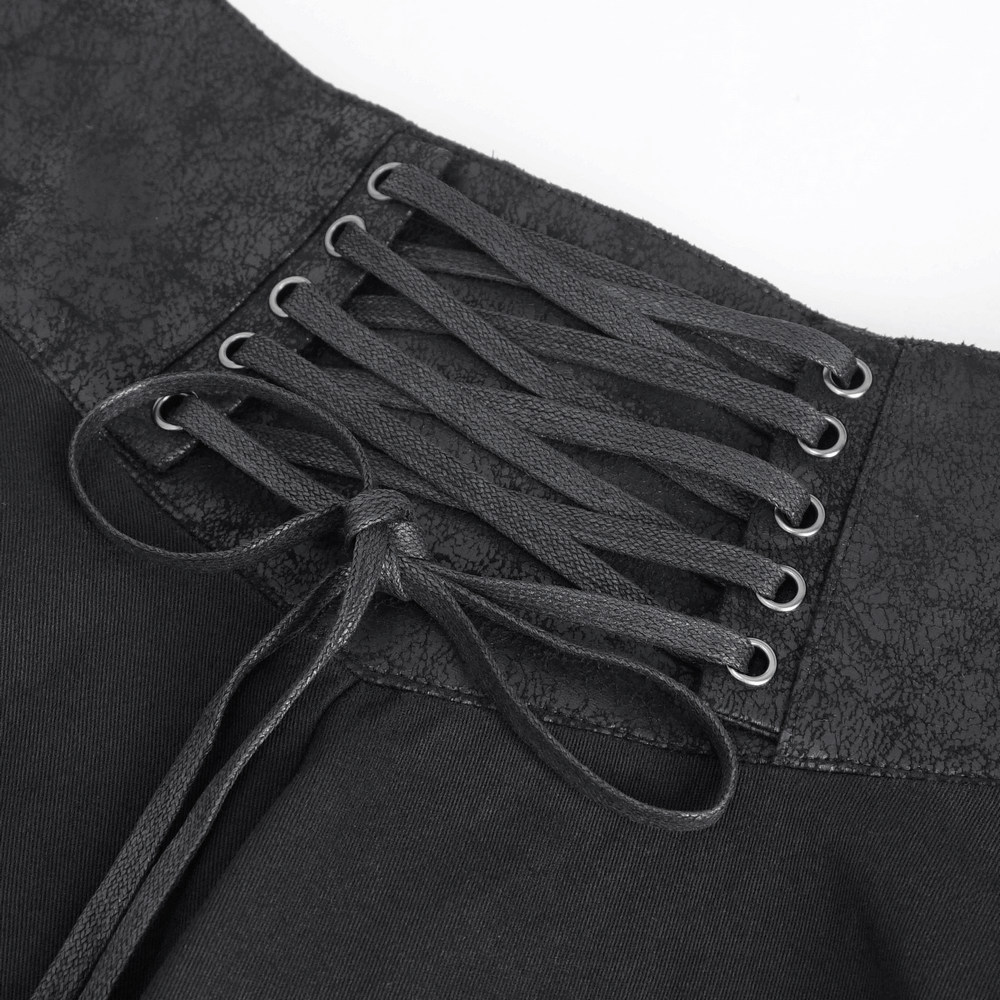 Close-up of a black high waist skirt with steampunk-style lacing detail for a vintage look.