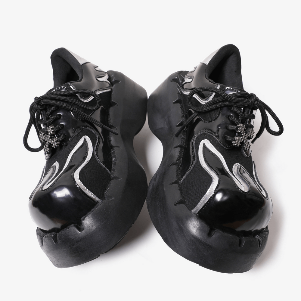 Women's Cyber Goth Silver Flame Platform Sneakers in black with glossy silver flame panels and chunky platform soles
